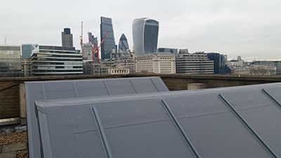 Hybrid Roofing solved the problem of weather ingress through the banks of 26 metal-clad northlights using Protan’s SE1.2mm single ply membrane standard overlap