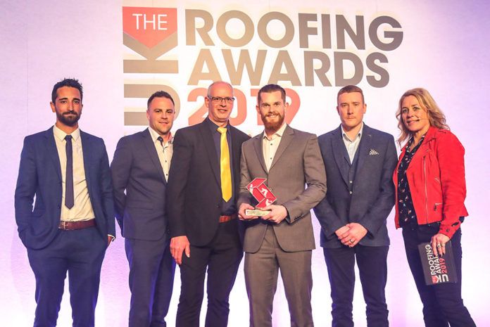 Progressive Systems receiving the award: (L-R) Levi Stephens, Luke Hardware, Brian Mack (EJOT technical manager - category sponsors) James Rayner, Chris Phillips and awards presenter Sarah Beeny.