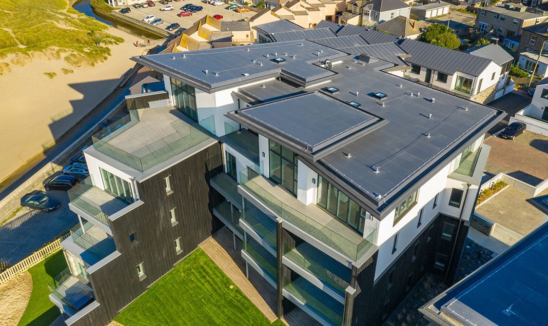The Dunes development in Perranporth: The challenge was to create effective waterproofing and weather resistant solutions for both the roof and balconies.