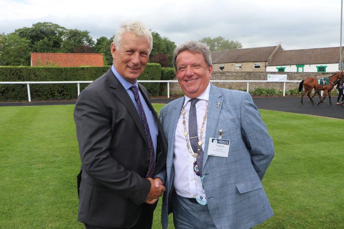Martin-Brooks’ John Elmore (right) is handed the NFRC regional chairmanship by predecessor, Gerald Parker