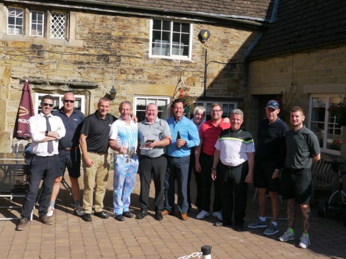 Martin-Brooks’ contracts director, dale wright, (third left) with some of the competitors at the firm’s latest charity golf day