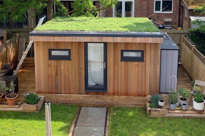 An example of Wallbarn's M-Tray modular green roof solution installed on a garden building