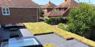 Industry call for greener Green Homes Grant Wallbarn’s M-Tray modular green roof during installation on a domestic flat roofed home extension