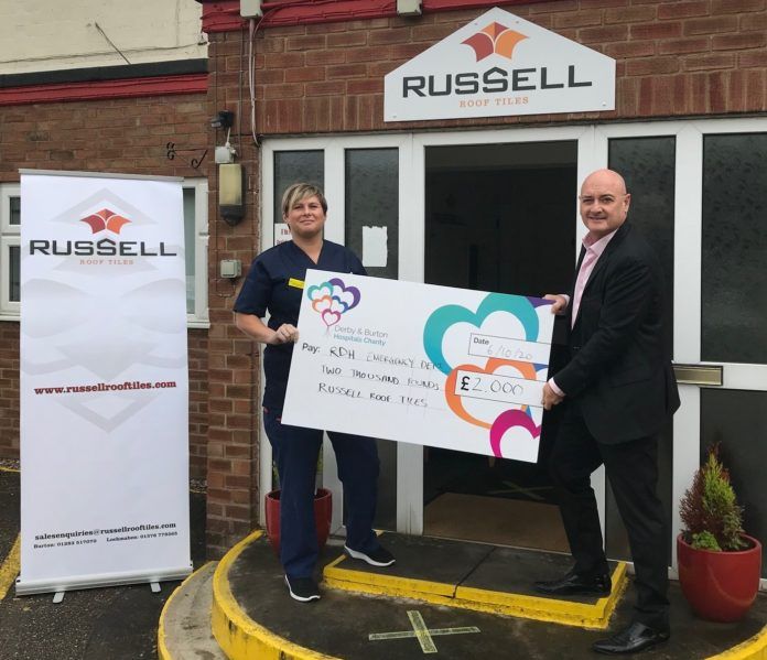 Left to right: Sarah Hansen, a sister in the A&E department at Derby and Burton Hospitals Charity, and Andrew Hayward, managing director at Russell Roof Tiles