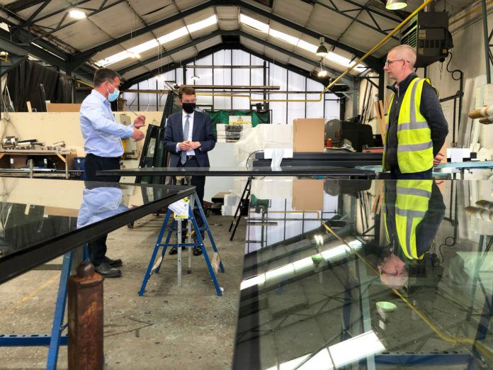 Mayor Andy Street (centre) visited Howells Patent Glazing to find out some of the measures it has put in place to support the mental health and wellbeing of its employees