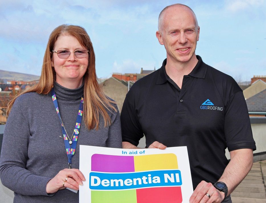 Barry Mairs MD of GBS Roofing with Jacqui McCurdy of Dementia NI.