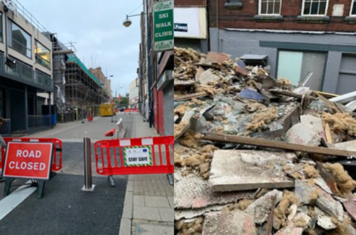 Significant amounts of asbestos-containing debris to the front and rear of the building and along the public highway.