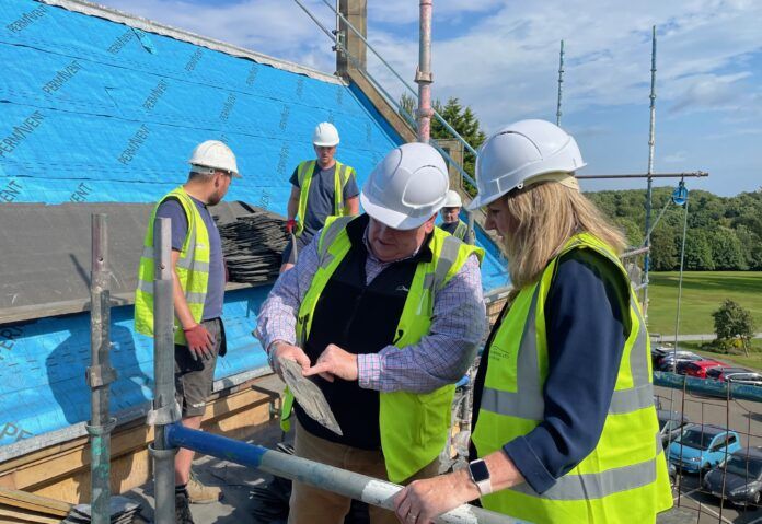 Alison Johnstone MSP on site with Compass Roofing.