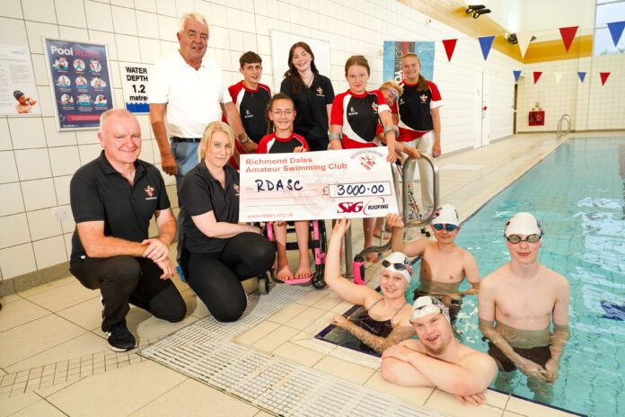 Kneeling Front: Coach Keith Hall, Coach Zoe Cowan, Back Row: Graham Jennings – SIG, swimmers Archie Hare, Isla Lewis-Brown, Coach Kylah Cowan, Sophia Newton, Emil Mason, Lucy Scott. In the water - front: Maisie Catt, William Lake, Jack Waikari, Tomas Davies.