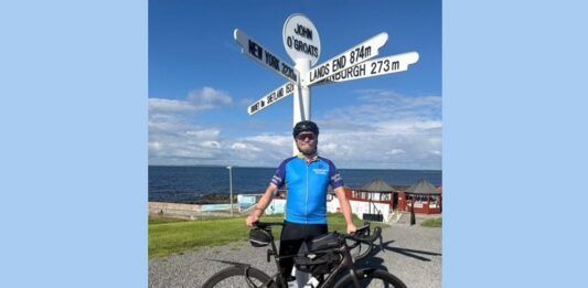 Travis Perkins manager surpasses bike ride fundraising target Travis Perkins