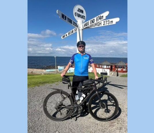 Travis Perkins manager surpasses bike ride fundraising target Travis Perkins